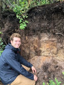 Elliott Boe assessing a soil profile